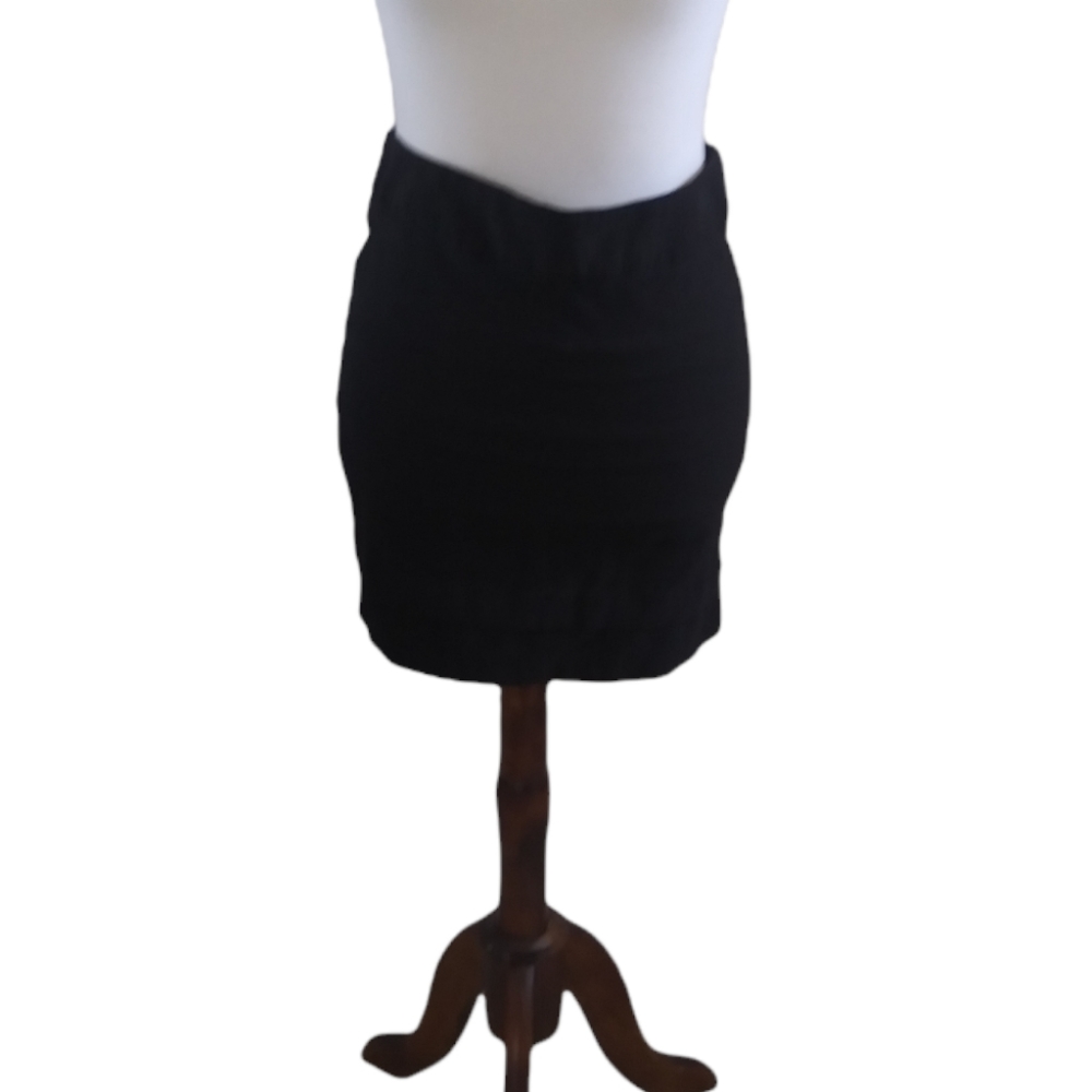 Black pleated mini skirt.